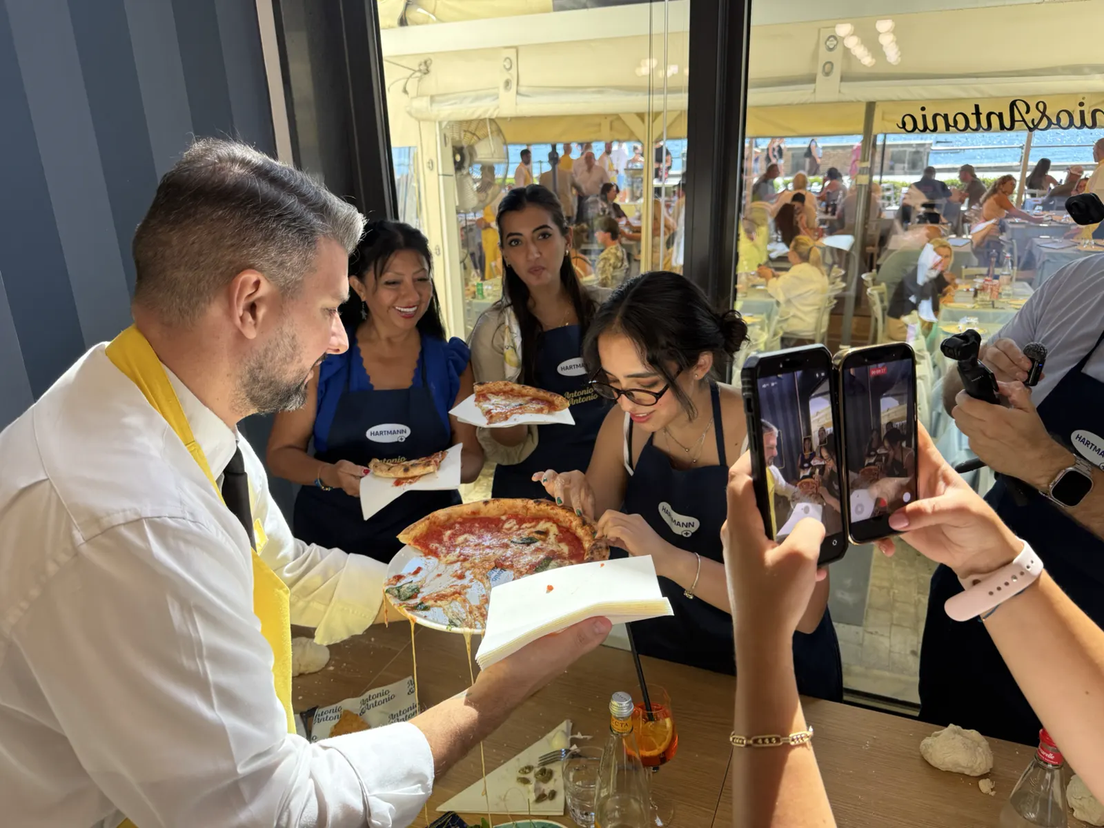 Riviera Cristallina Experience travellers during a pizza class in Naples